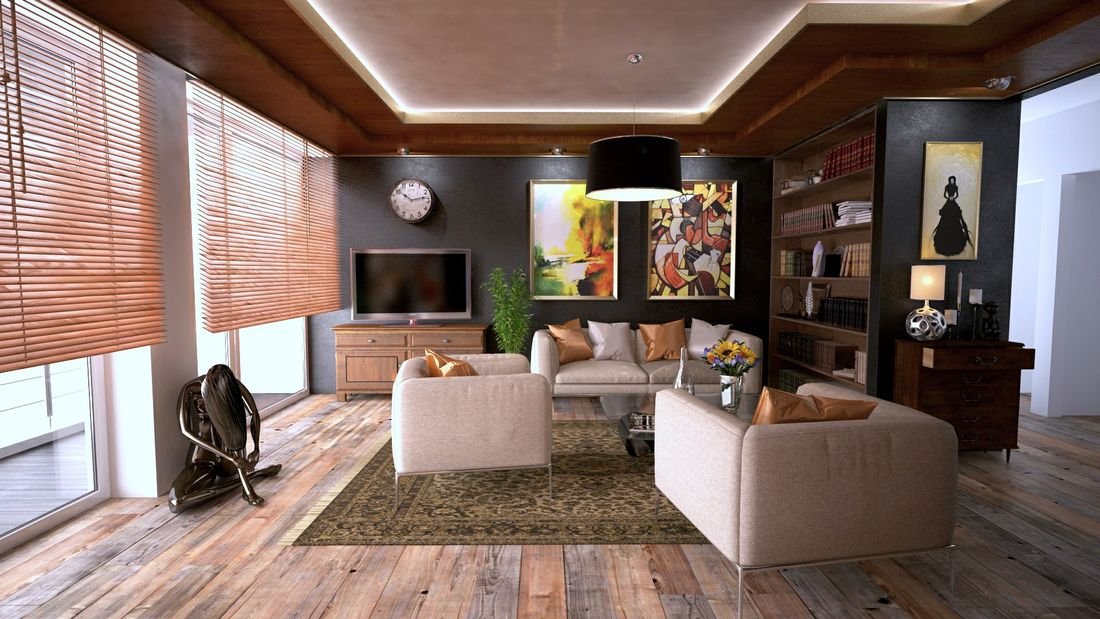 Living room fitted with wood horizontal blinds filtering warm daylight