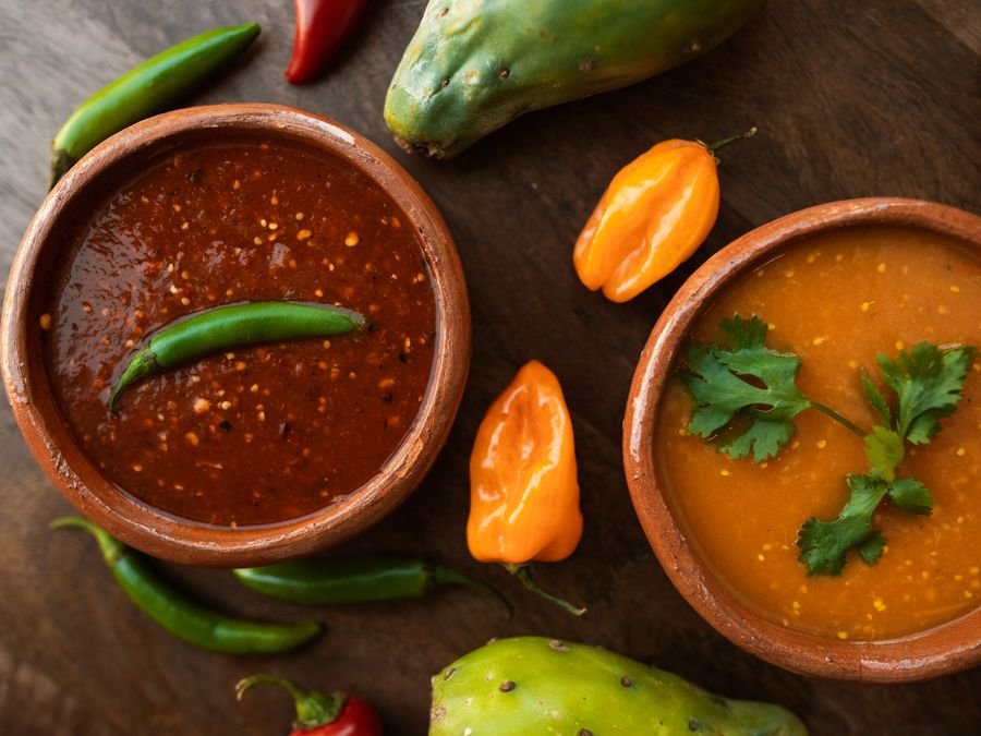 Representative photo of house-made red and tomato salsas with fresh chiles