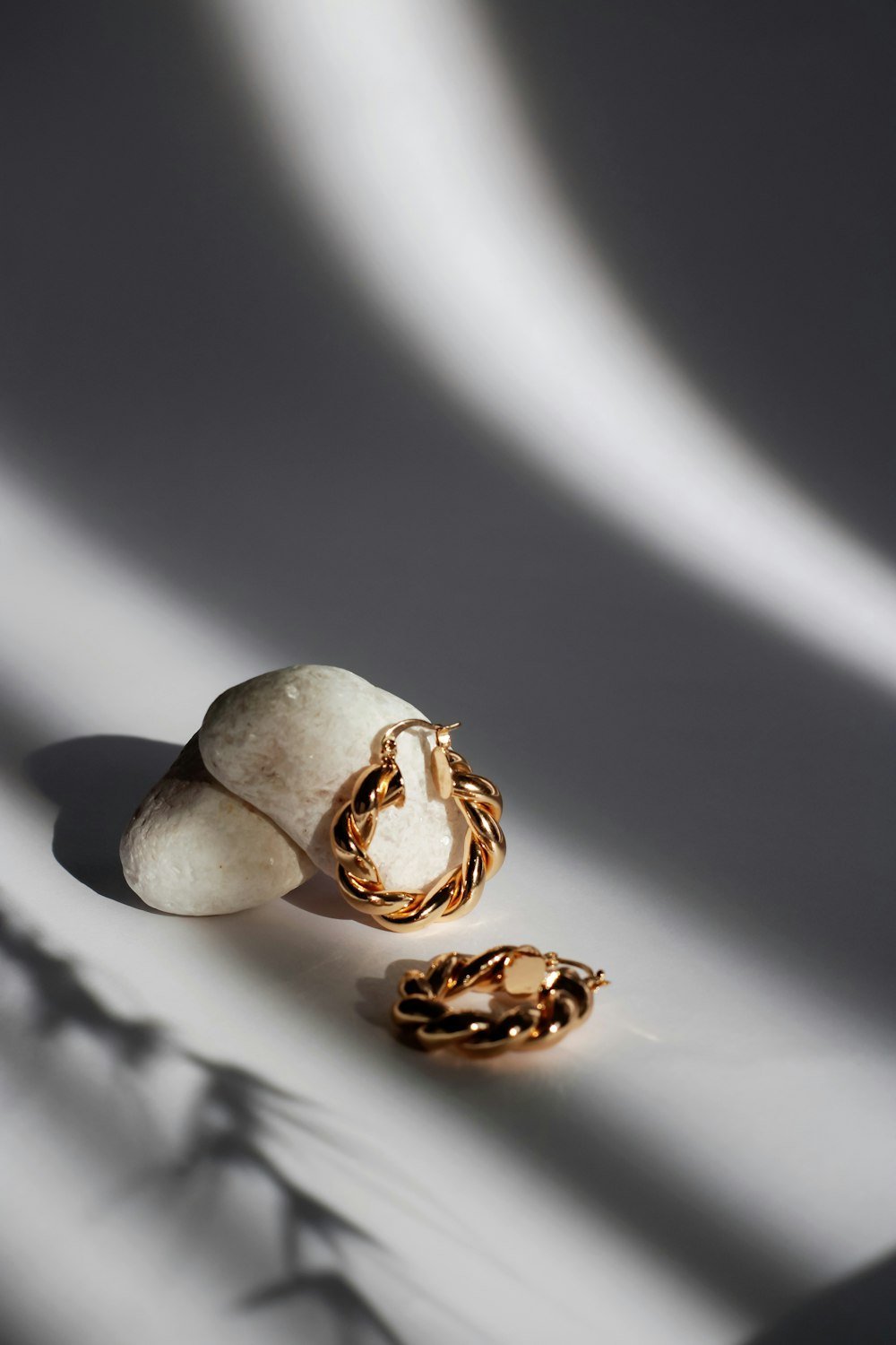 Representative photo of a pair of gold hoop earrings — client inventory swaps in