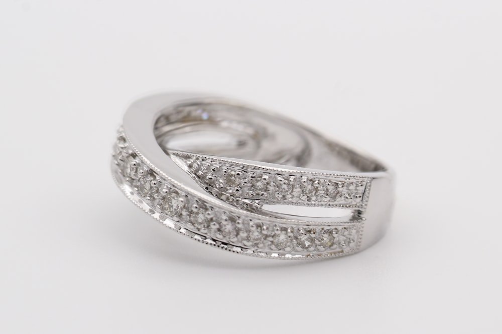Representative photo of a white-gold pave diamond ring — client inventory swaps in